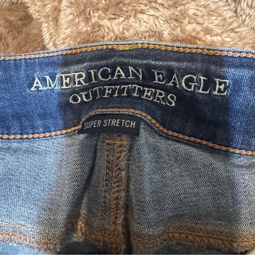 American Eagle Outfitters Blue Ripped Flare Super Stretch Jeans - Picture 9 of 11